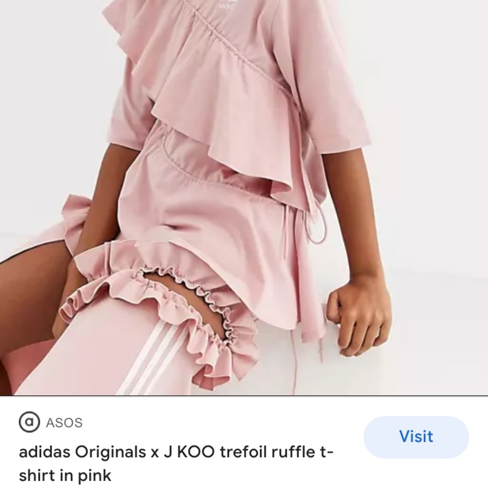 Brand new never worn pink Adidas ruffle top. So cute!